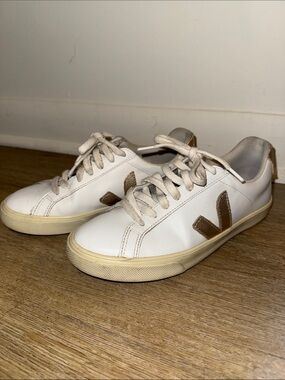 Veja white and gold sneakers